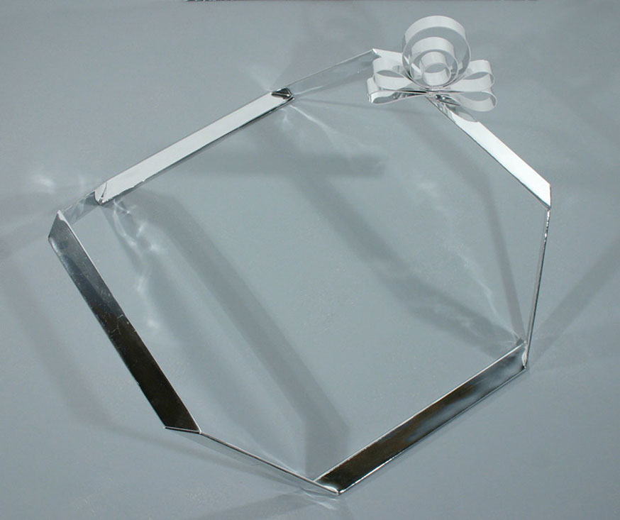 Chrome Present, 2007, balsa wood and paper, 9 x 21 x 20 inches
		  / 23 x 53 x 51 cm