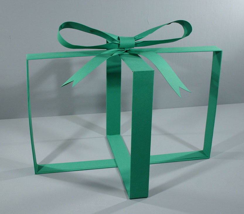 Green Present, 2007, balsa wood and paper, 18 x 22 x
		  16 inches / 56 x 56 x 41 cm