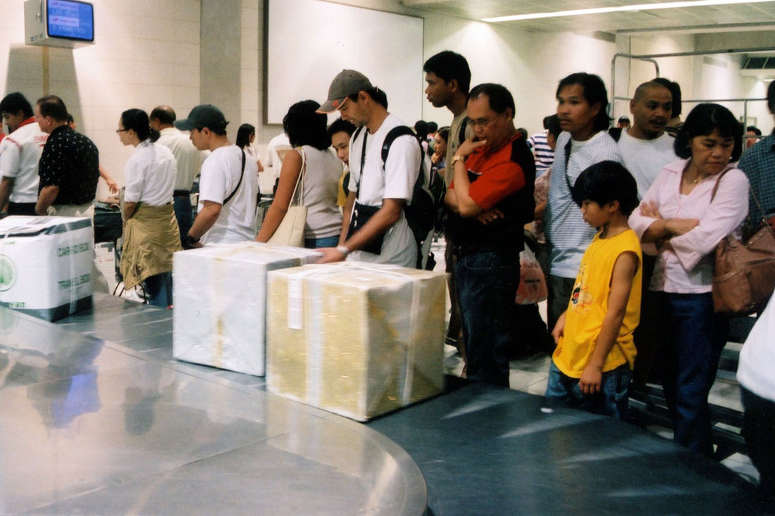 Regalos (Gold) and Regalos (Silver), on the luggage carousel at the Ninoy Aquino Airport in Manila, Philippines.</p>