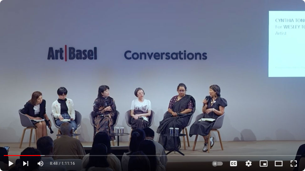 still of video with female panelists on stage at Art Basel Hong Kong