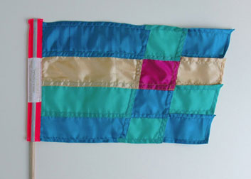 Irrational Exuberance (Asst. Colors) Mini Flags, 2012, fabric, thread, wood, woven labels, ~15 x 18 inches / 38 x 45 cm each