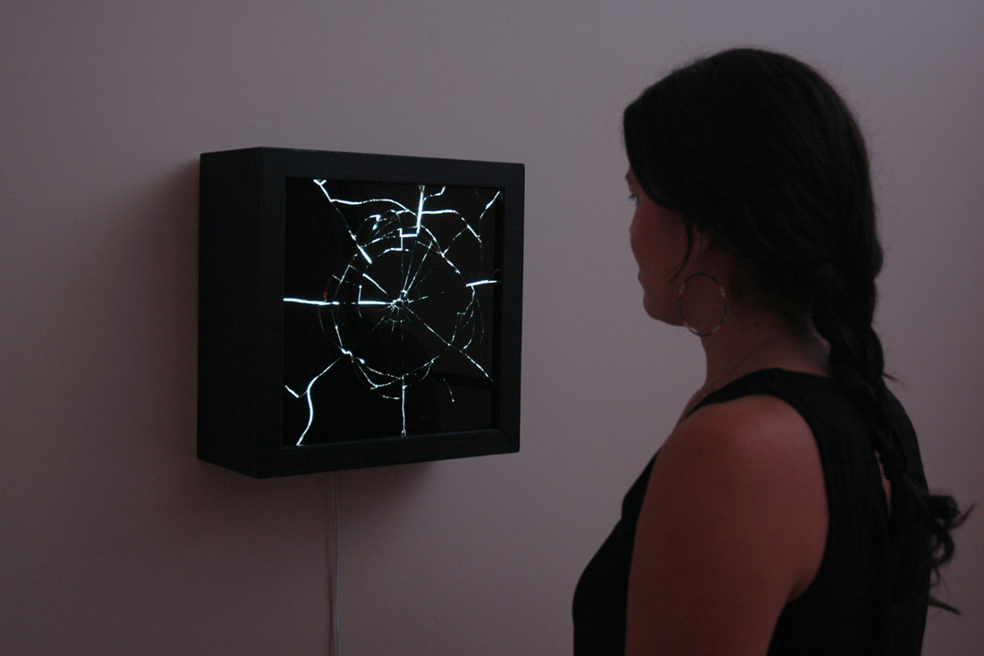 Mirror #1 (interaction view), 2014, 13.625 x 13.625 x 5.5 inches / 34.6 x 34.6 x 14 cm, wood, asphalt-based coating, light, acrylic, mirror