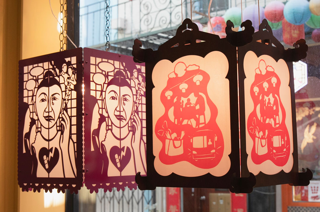 2 lanterns in Chinese Culture Center's storefront