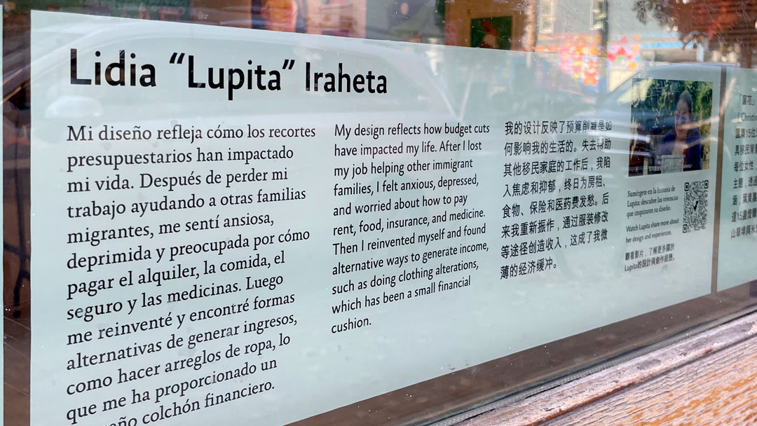 close up of a sign with a statement installed in a window, by Lupita Iraheta
