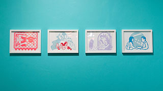A row of 4 papercuts framed in white frames.