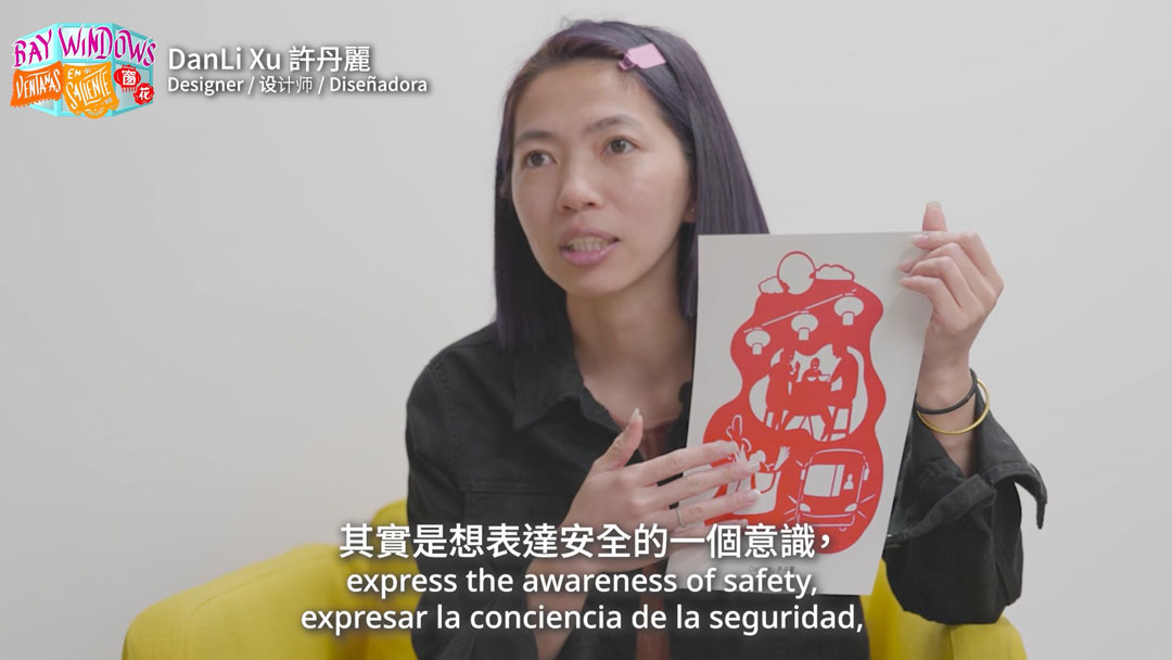 still of trilingually subtitled video interview with a woman, available at the link