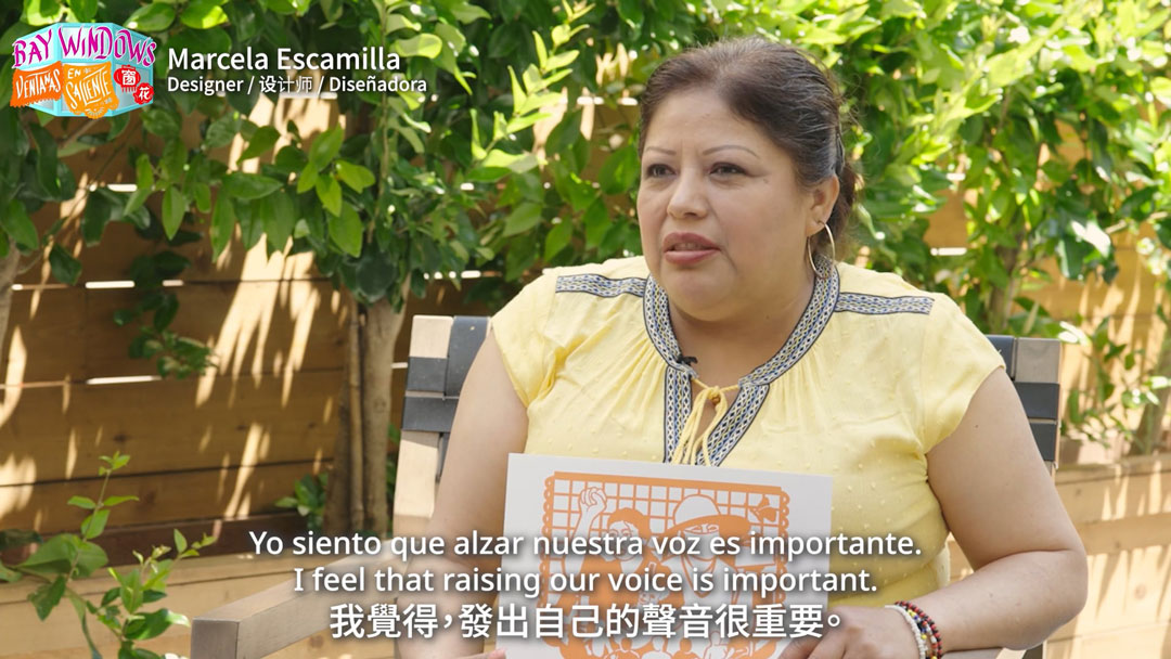 still of trilingually subtitled video interview with a woman, available at the link